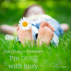 Child lying on grass outdoors in spring park