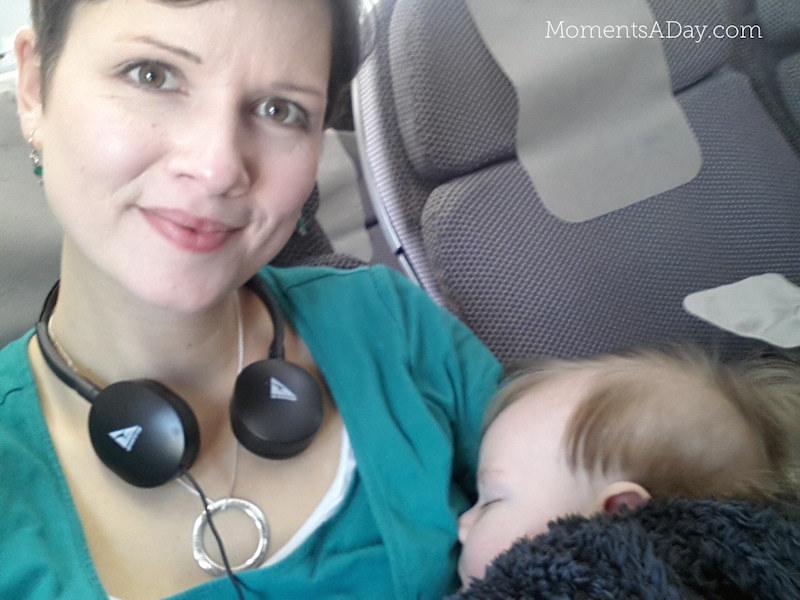 Enjoying Qantas flight with sleeping baby