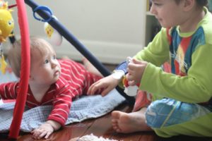How to Play with a Baby – Tips for Teaching New Big Siblings